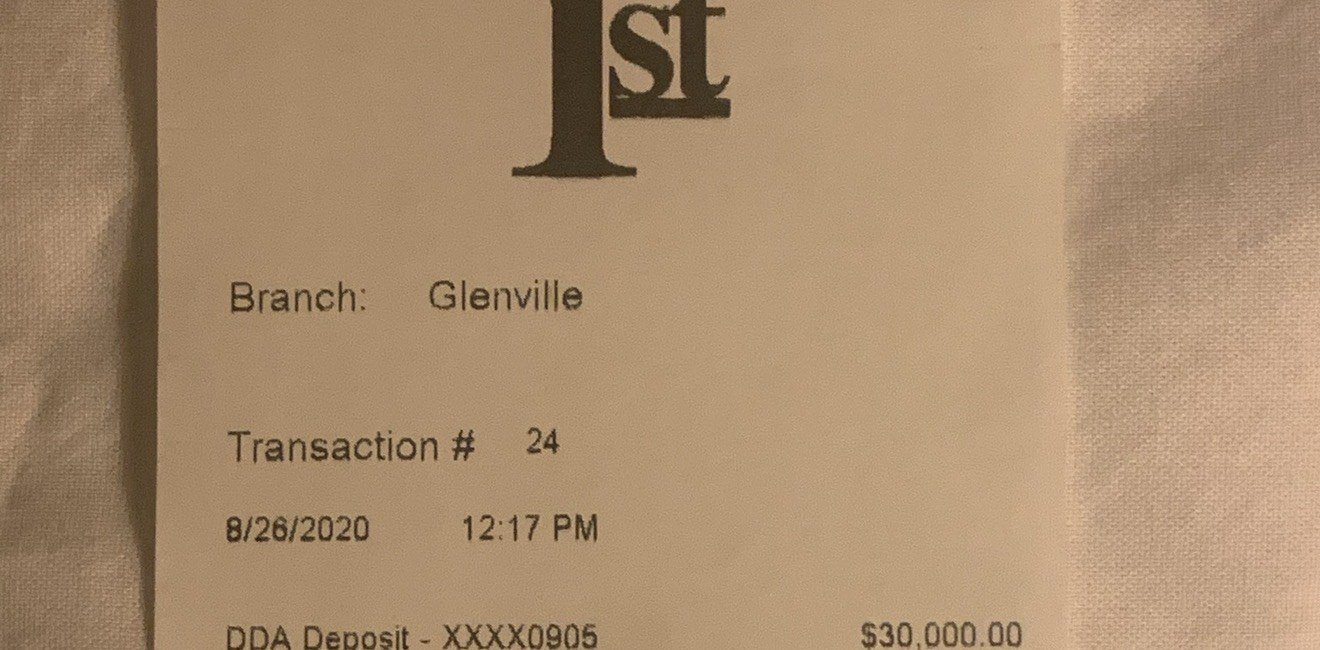 Bank deposit receipt dated August 26, 2020 showing a 30,000 dollar deposit.